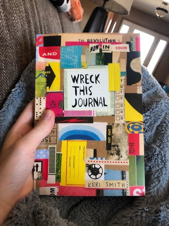a reviewer holding the wreck this journal