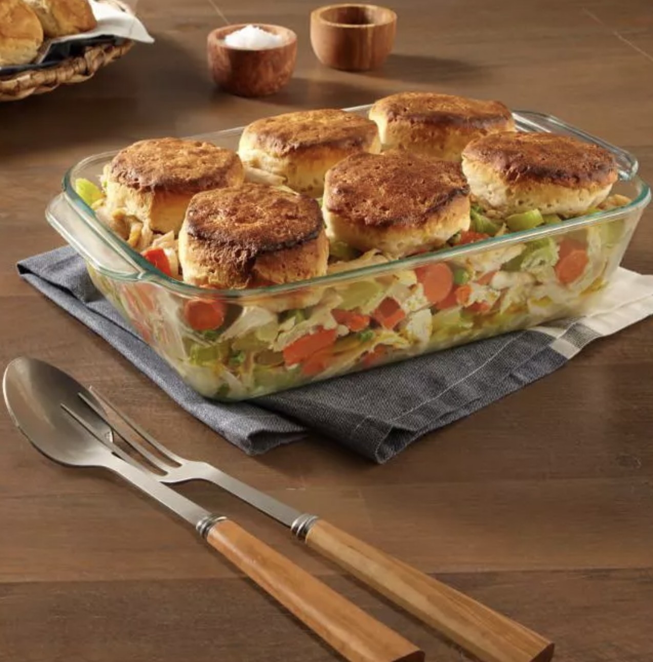 the baking dish with food inside of it