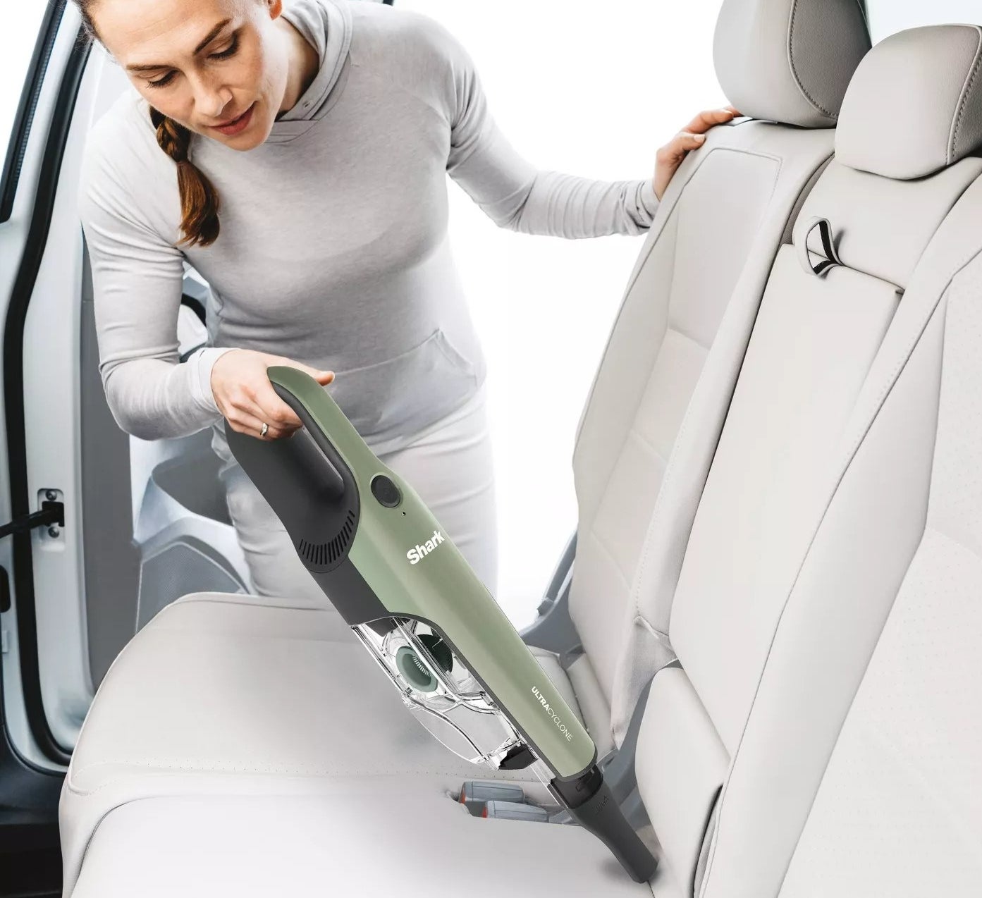 The vacuum being used on car seats