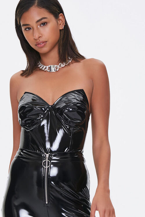 Model in black vinyl sweetheart bodysuit