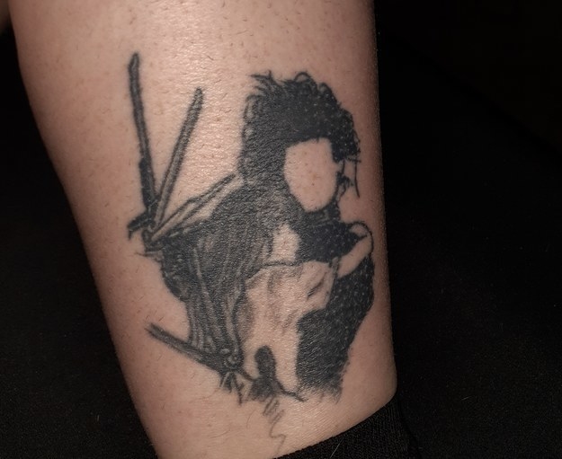 A simple tattoo outline of a scene from &quot;Edward Scissorhands&quot;