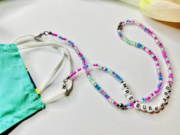 purple, blue, and green beaded mask chain with personalized letter beads