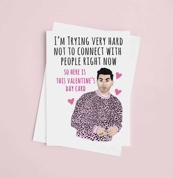 schitt&#x27;s creek card that says &quot;I&#x27;m trying very hard not to connect with people right now, so here is this Valentine&#x27;s Day card&quot; with David Rose on the top and three hearts