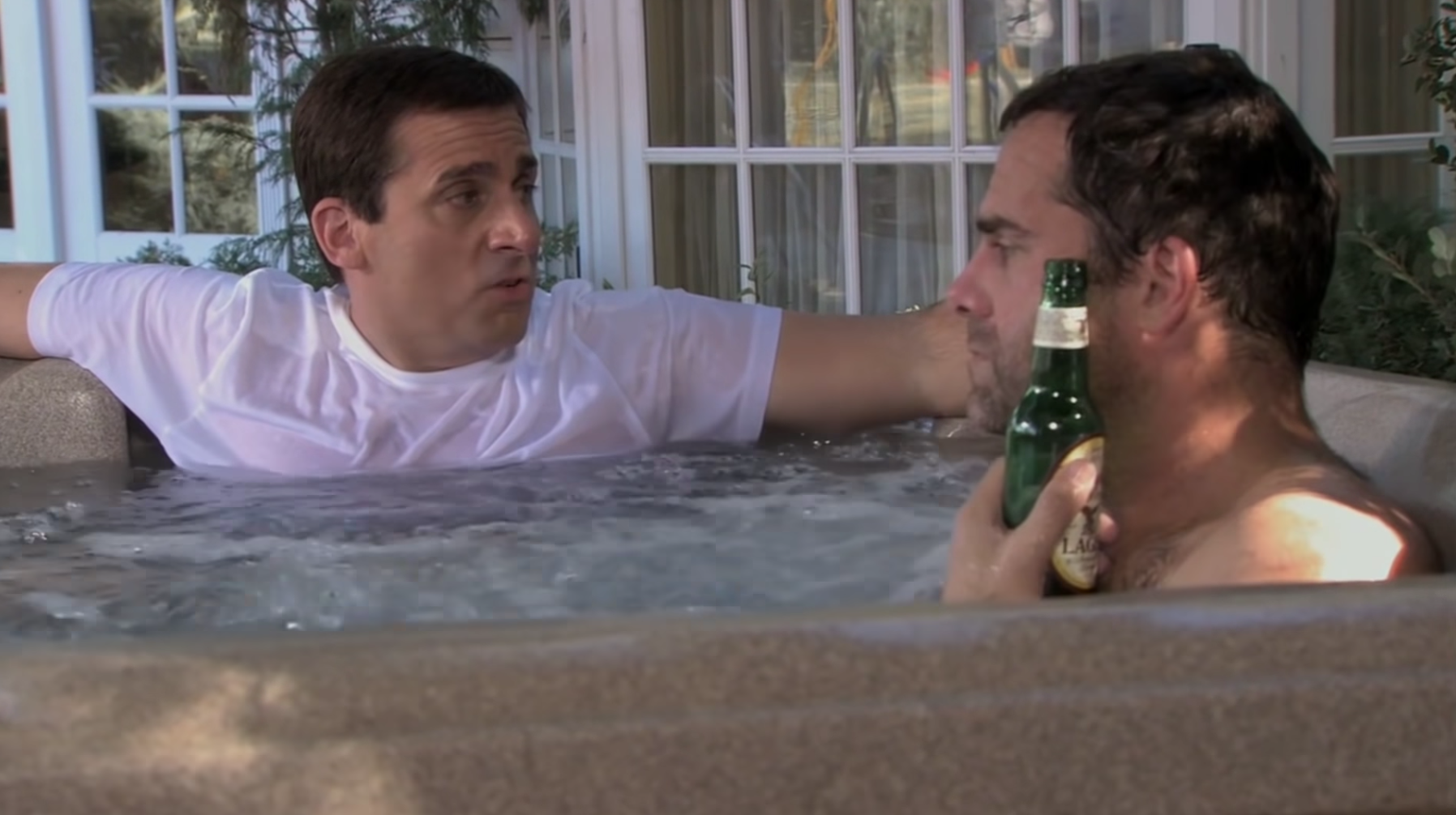Michael in a hot tub while wearing a shirt