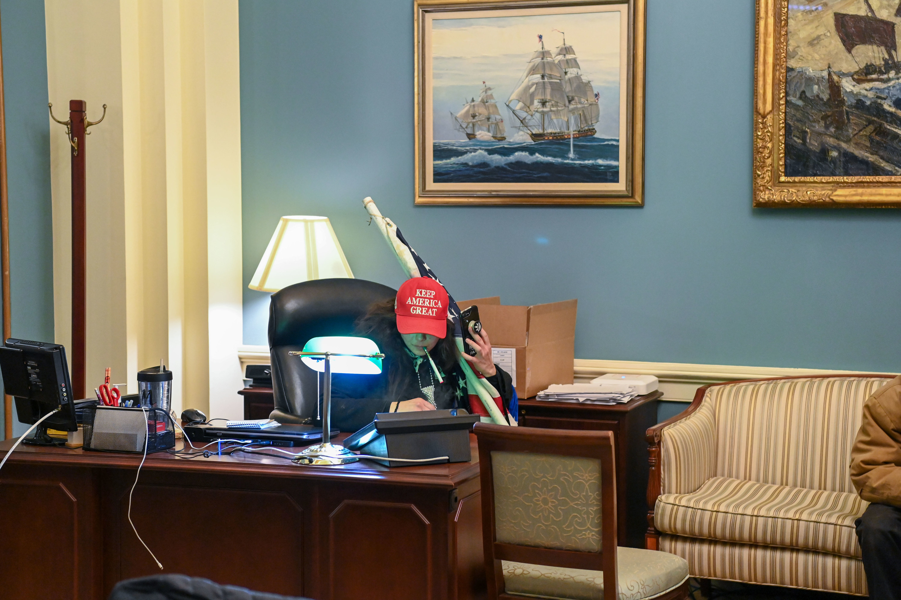 A Trump supporter in the office of a member of Congress