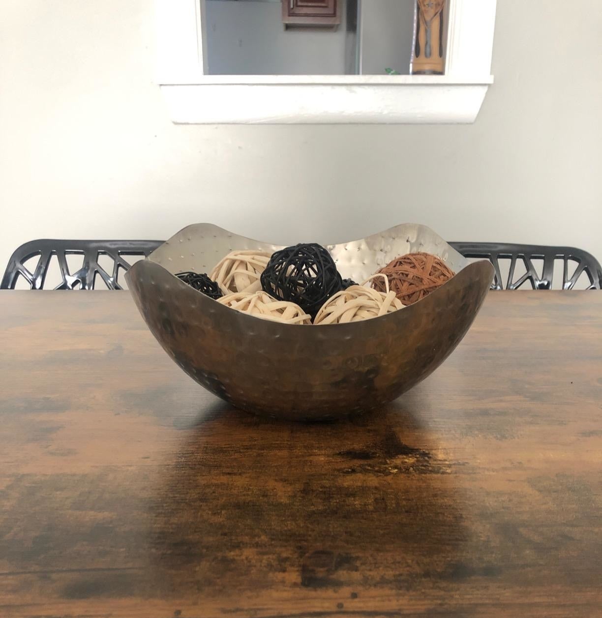 The bowl hammered metal bowl