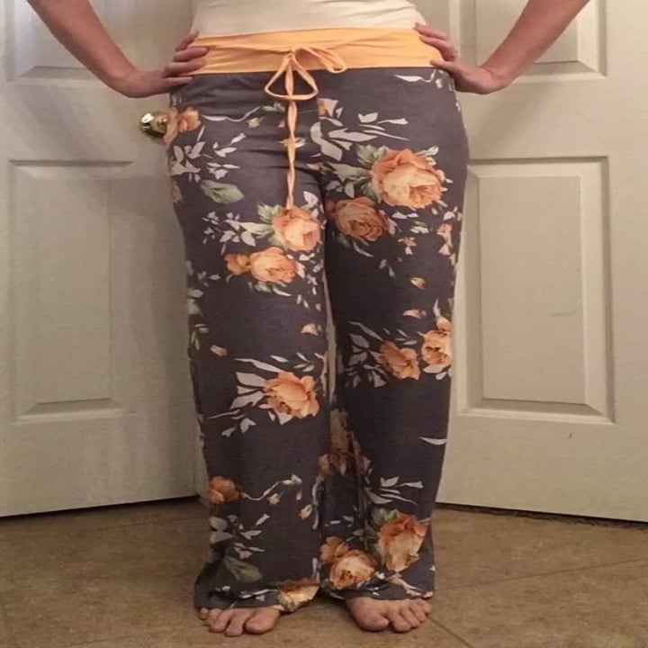 Amazon reviewer wearing high-waisted pajama pants