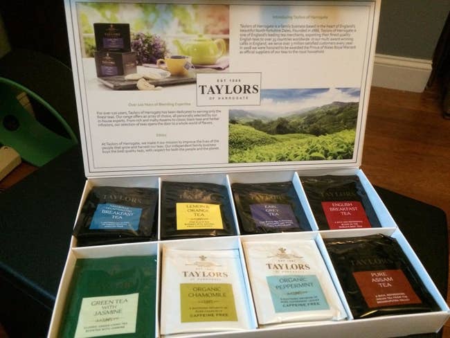reviewer photo showing the tea sampler box open with a variety of different teas in it