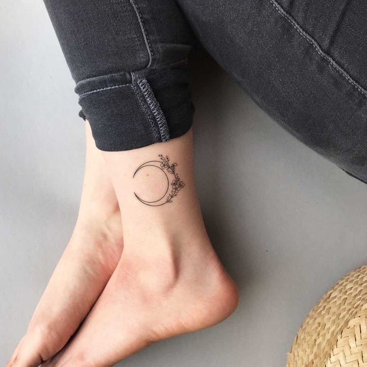 the crescent moon tattoo on an ankle 