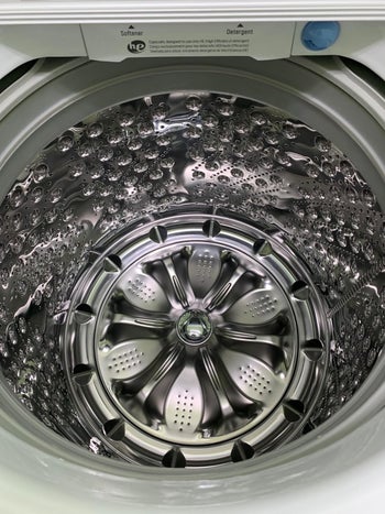Reviewer image of a clean washing machine after using the tablets