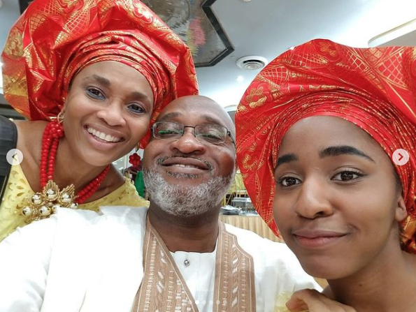 Ayo and her parents in Nigerian apparel 