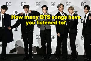 The BTS group is posing at an event labeled, "How many BTS songs have you listened to?"