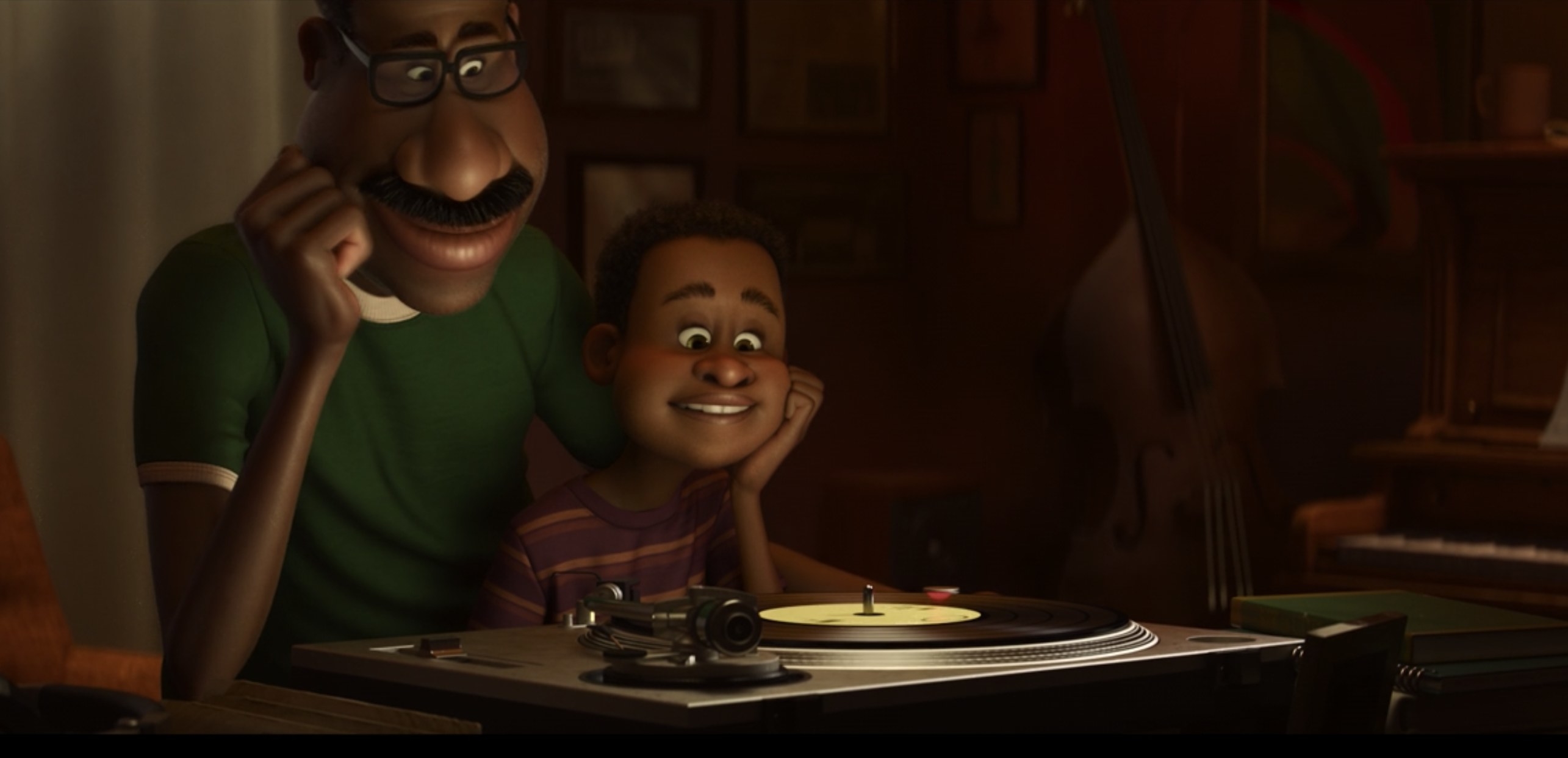 Joe as a kid listening to music with his father