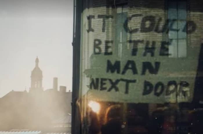 A sign that says "It could be the man next door"