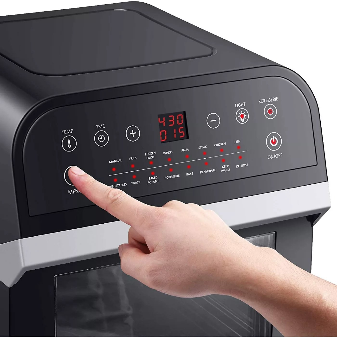 The electric panel of the air fryer with presets for fries, frozen food, wings, pizza, steak, chicken, fish, vegetables, toast, baked potato, rotisserie, bake, dehydrate, keep warm, and defrost
