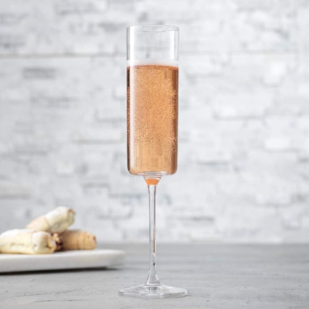 a close up shot of the champagne flute