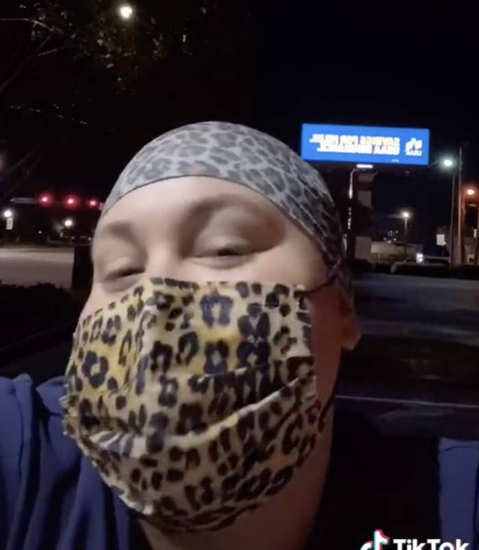 Savanna with a mask on outside a hospital