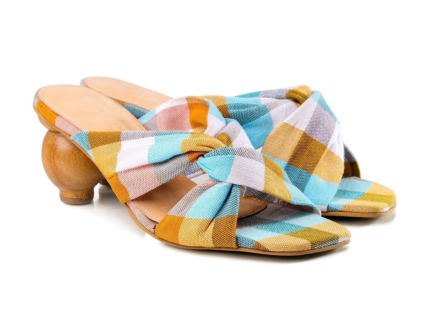 the mules with circular heel and yellow, blue, and white plaid cross-top mules
