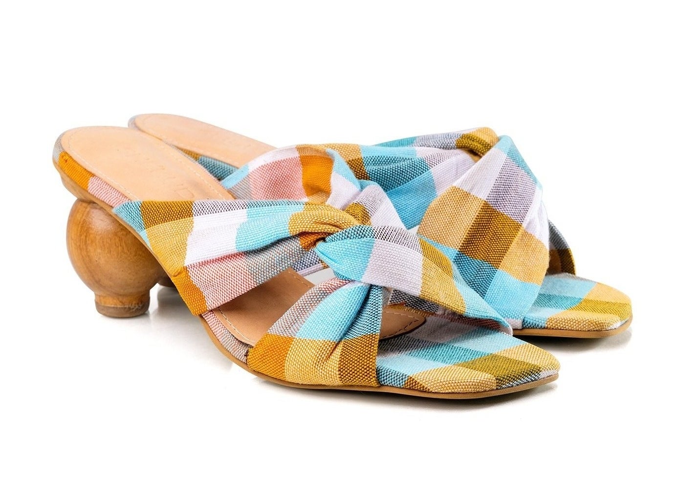 the mules with circular heel and yellow, blue, and white plaid cross-top mules