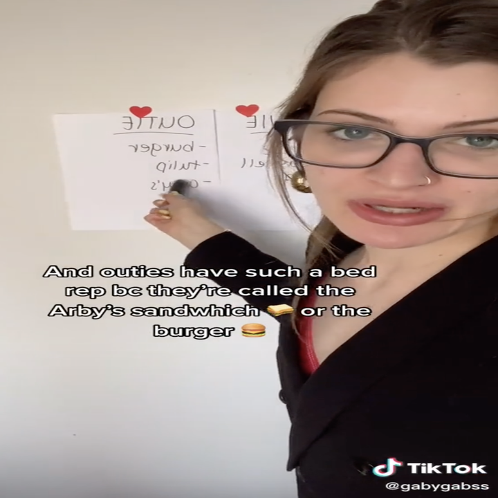 An image of Gabriella describing how "outies" are sometimes compared to an Arby's sandwich