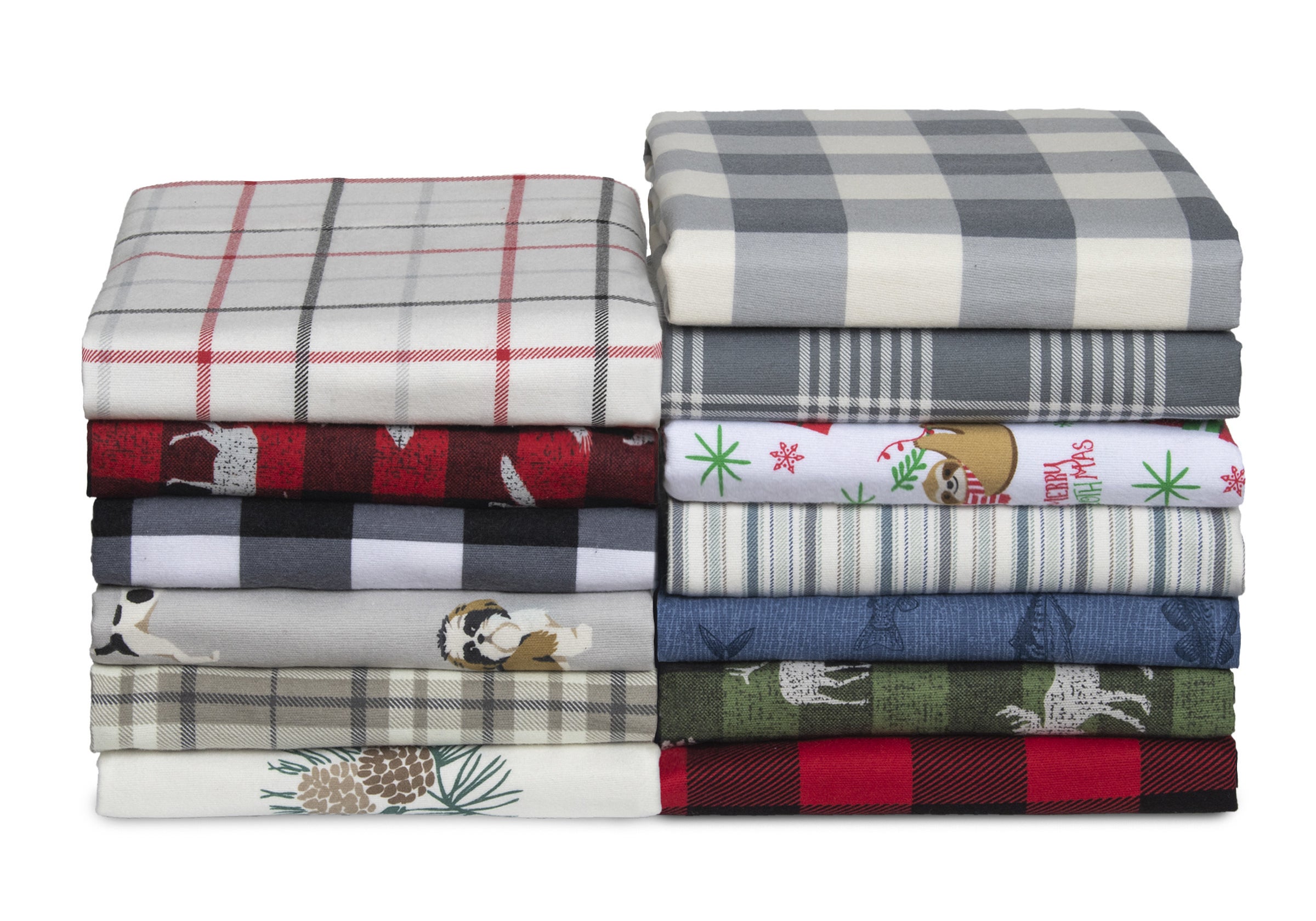 two stacks of sheets in various colors and prints such as moose and dogs 