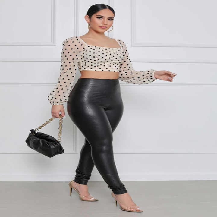 model wearing the square-neck crop top with black leather pants 