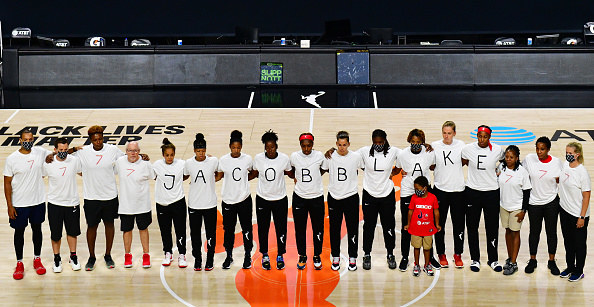 WNBA players in Jacob Blake shirts