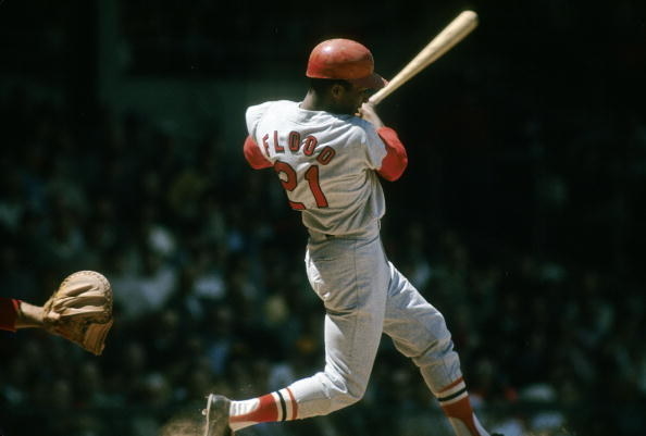 Curt Flood swinging a bat