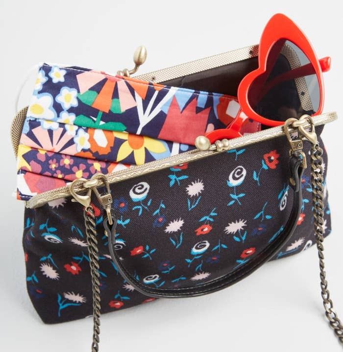 The moveable garden clutch in black and floral