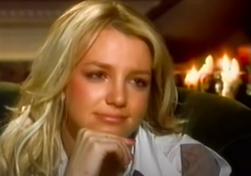 Britney with a look of disbelief on her face