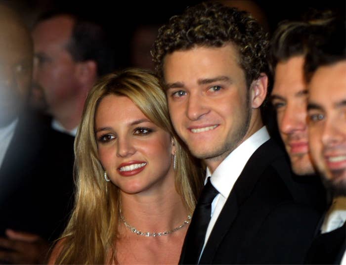 Britney posing for photos with Justin and other members of N'Sync