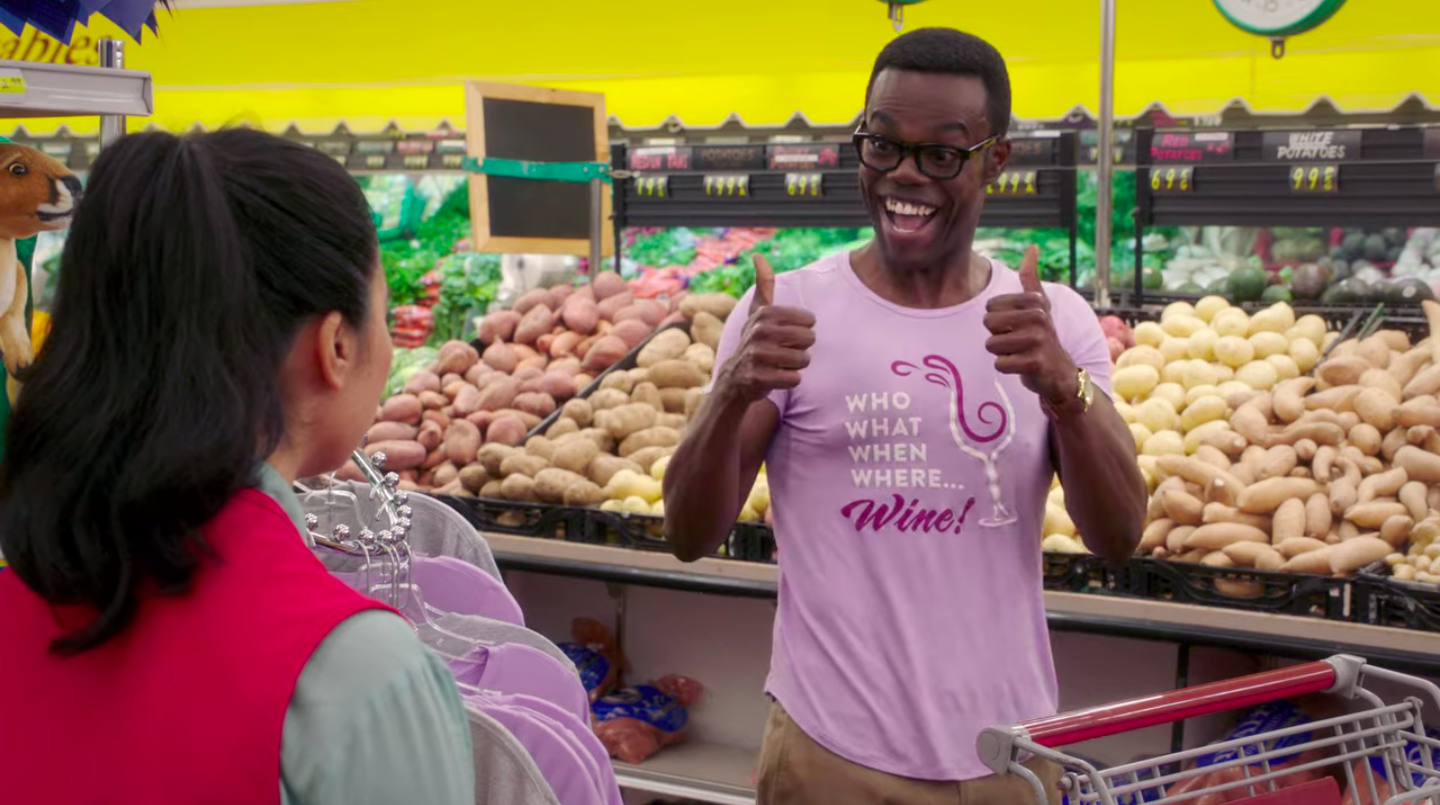Chidi&#x27;s shirt says, &quot;Who what when where...wine&quot;
