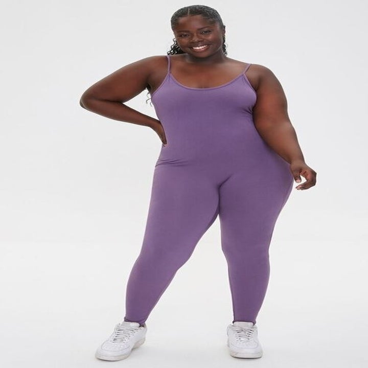 model wearing the purple jumpsuit 