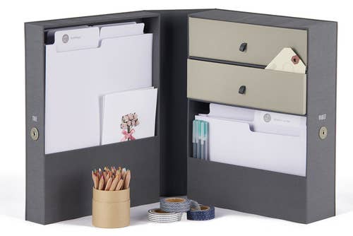 the navy organizer which has drawers, caddies, and file holders
