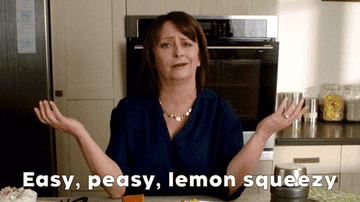 rachel dratch saying &quot;easy, peasy, lemon squeezy&quot; while standing in a kitchen