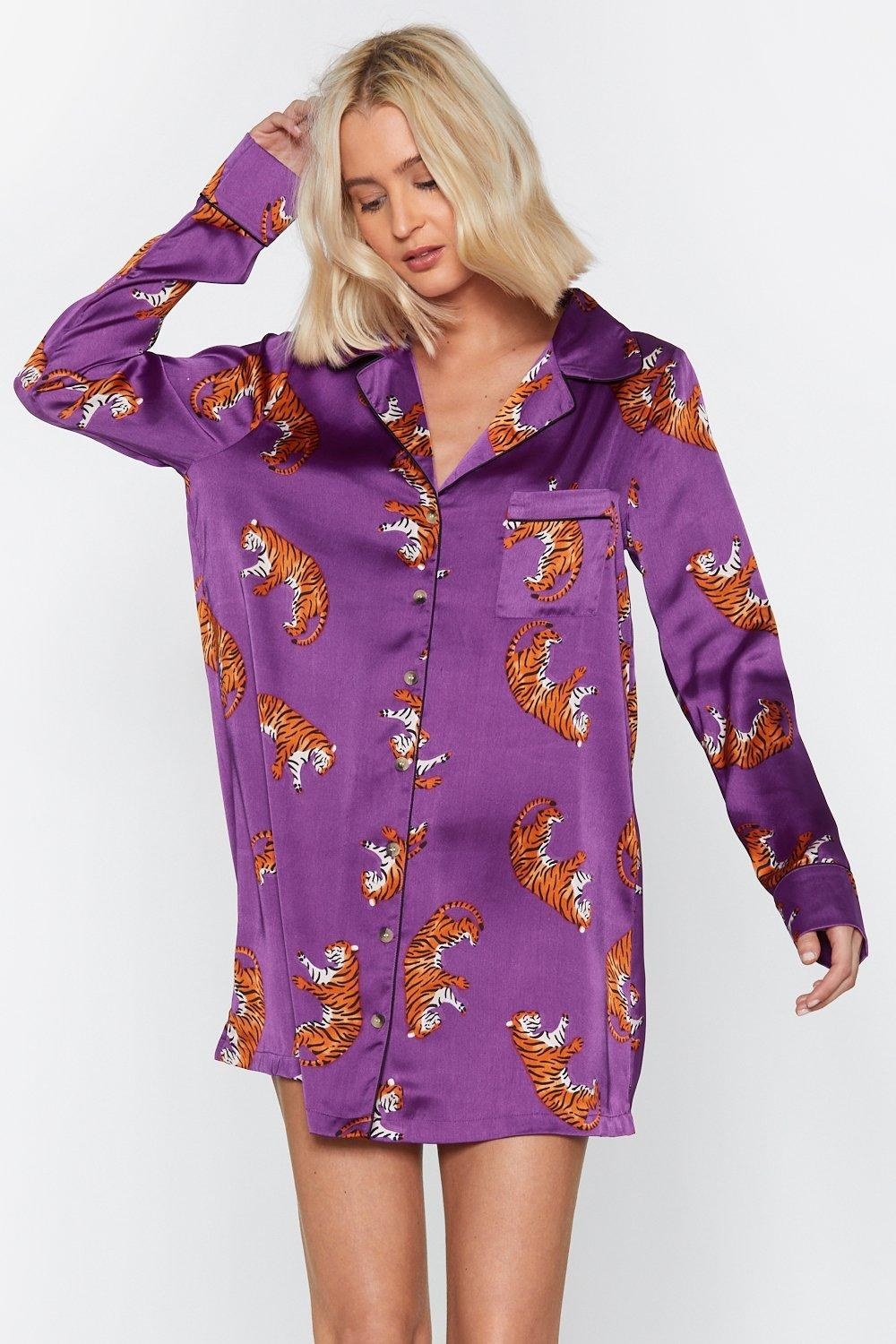 model wearing purple satin shirt with leopard print