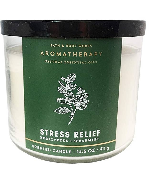 glass candle with green label
