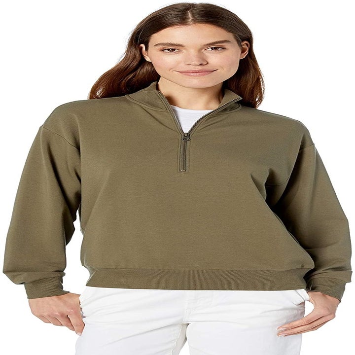 model wearing the olive green sweater 