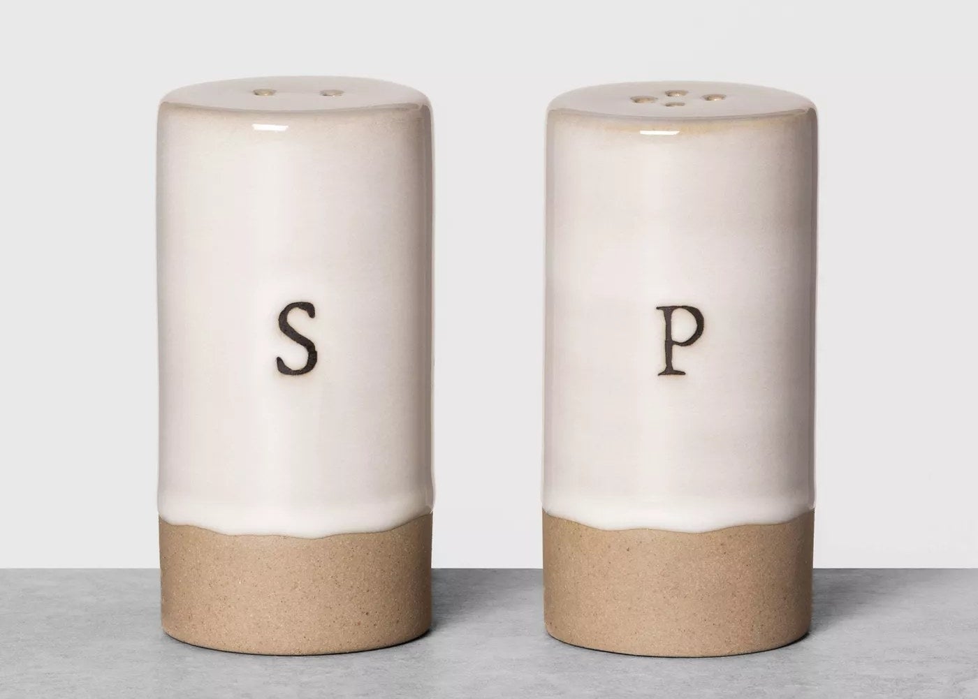 the cream shakers with an "s" and "p" on them