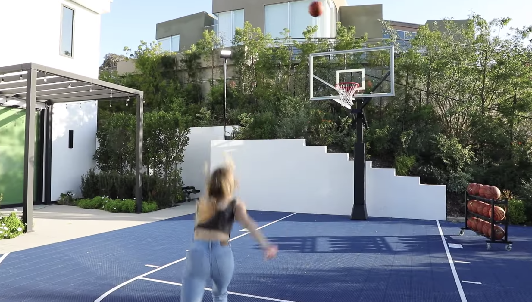 Girl throwing a basketball