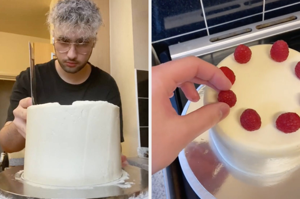 Ash smooths the cake during the video then places raspberries on top