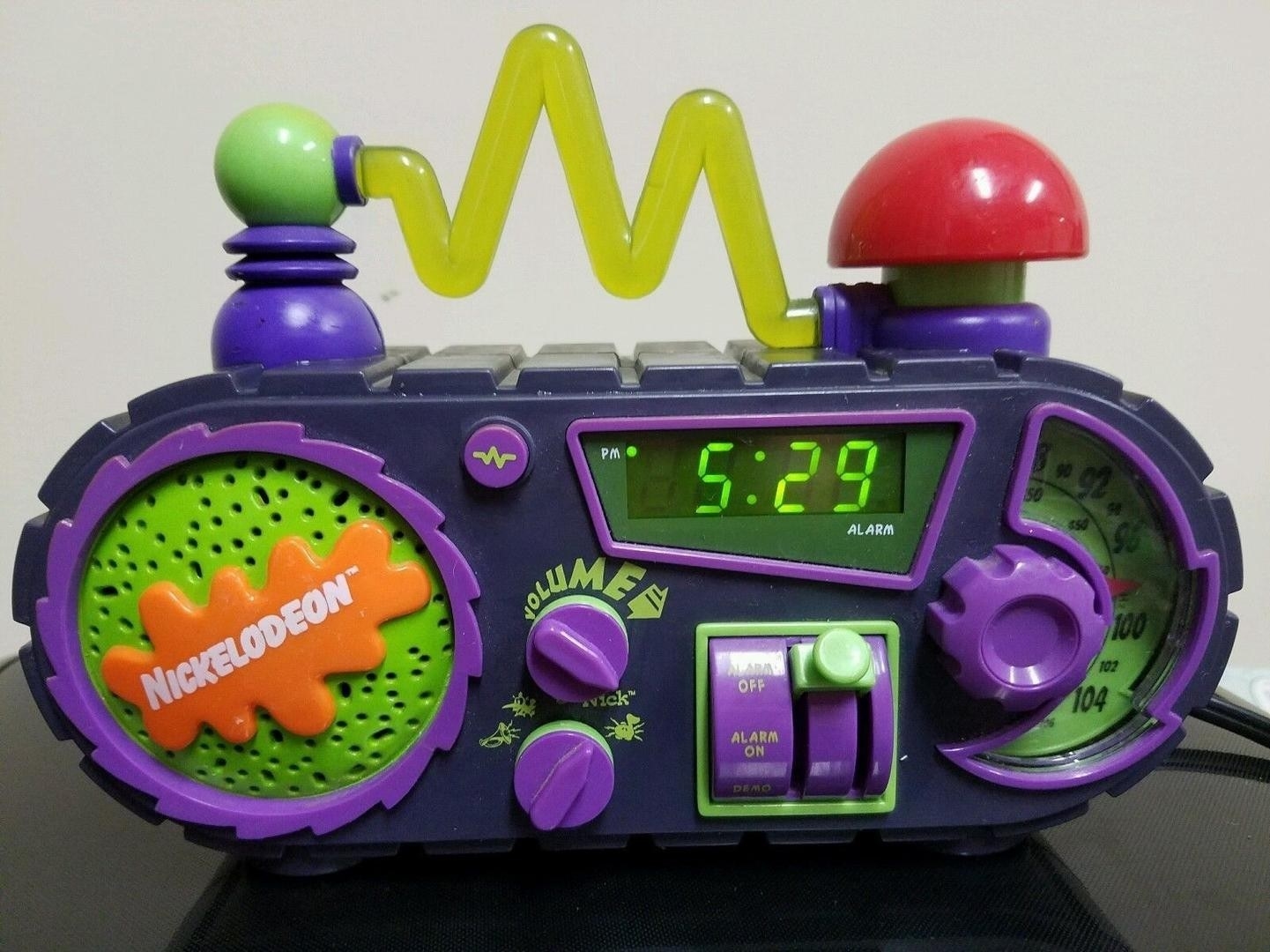 A purple and black mad scientist looking alarm clock