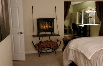 electric fireplace inside reviewer's bedroom