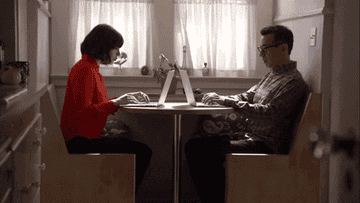 Two people typing on computers in &quot;Portlandia&quot;