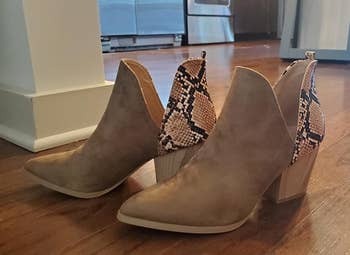 Reviewer image of the taupe and snakeskin booties
