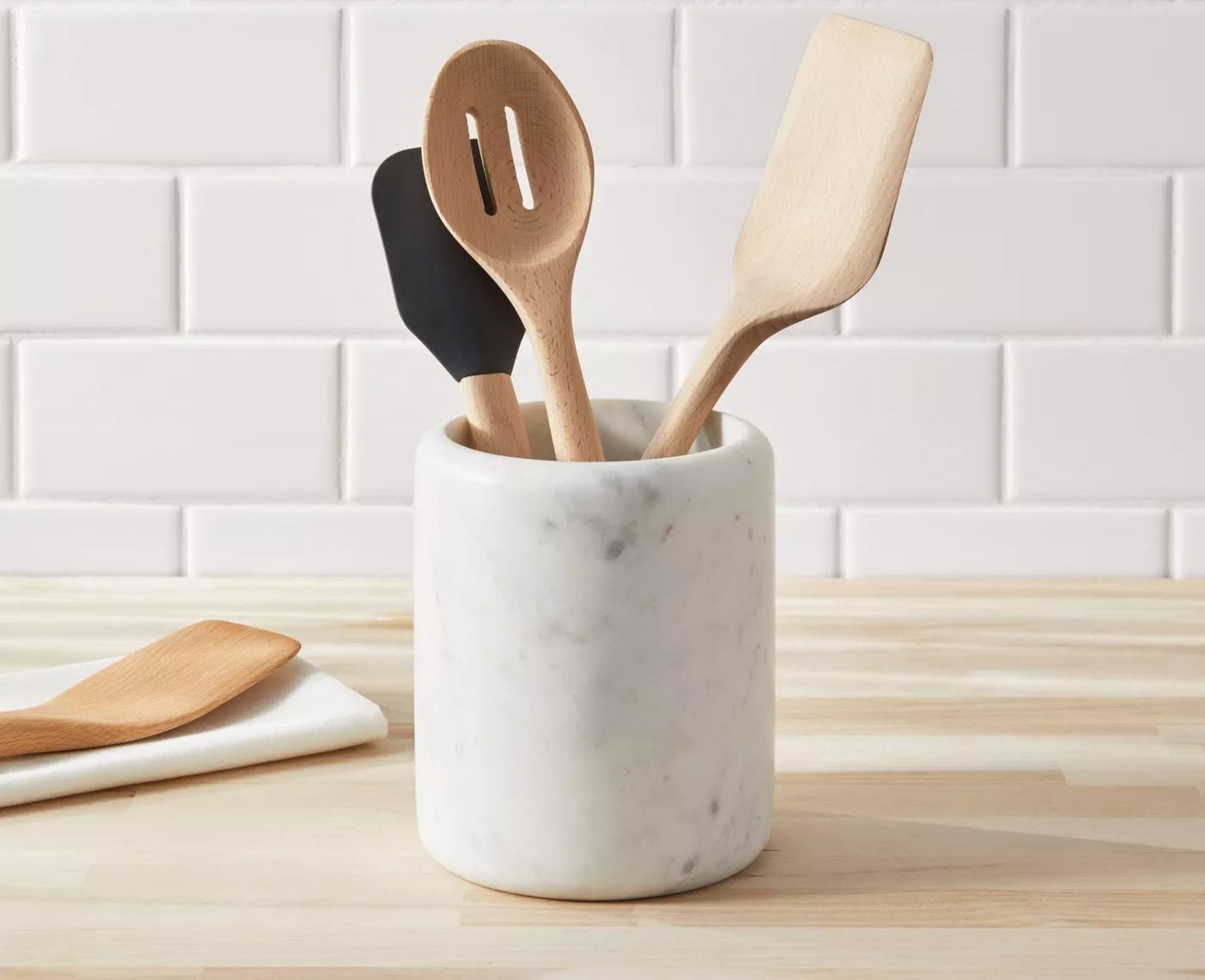utensil holder with utensils on counter