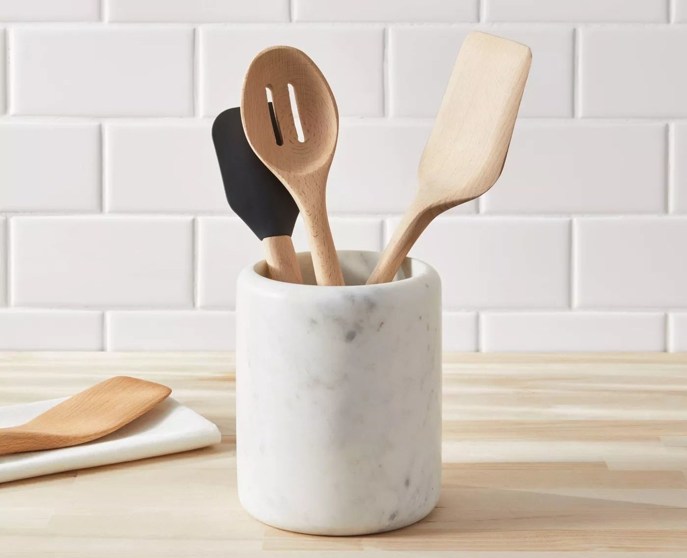 utensil holder with utensils on counter