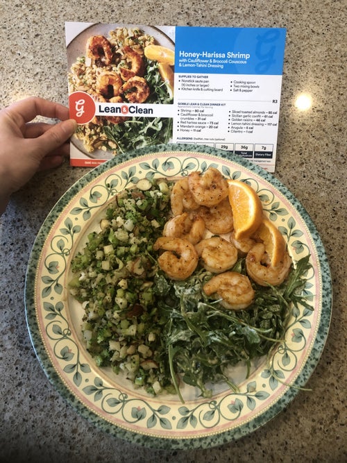 writer's cooked Gobble meal of marinated shrimp with arugula salad and broccoli mix