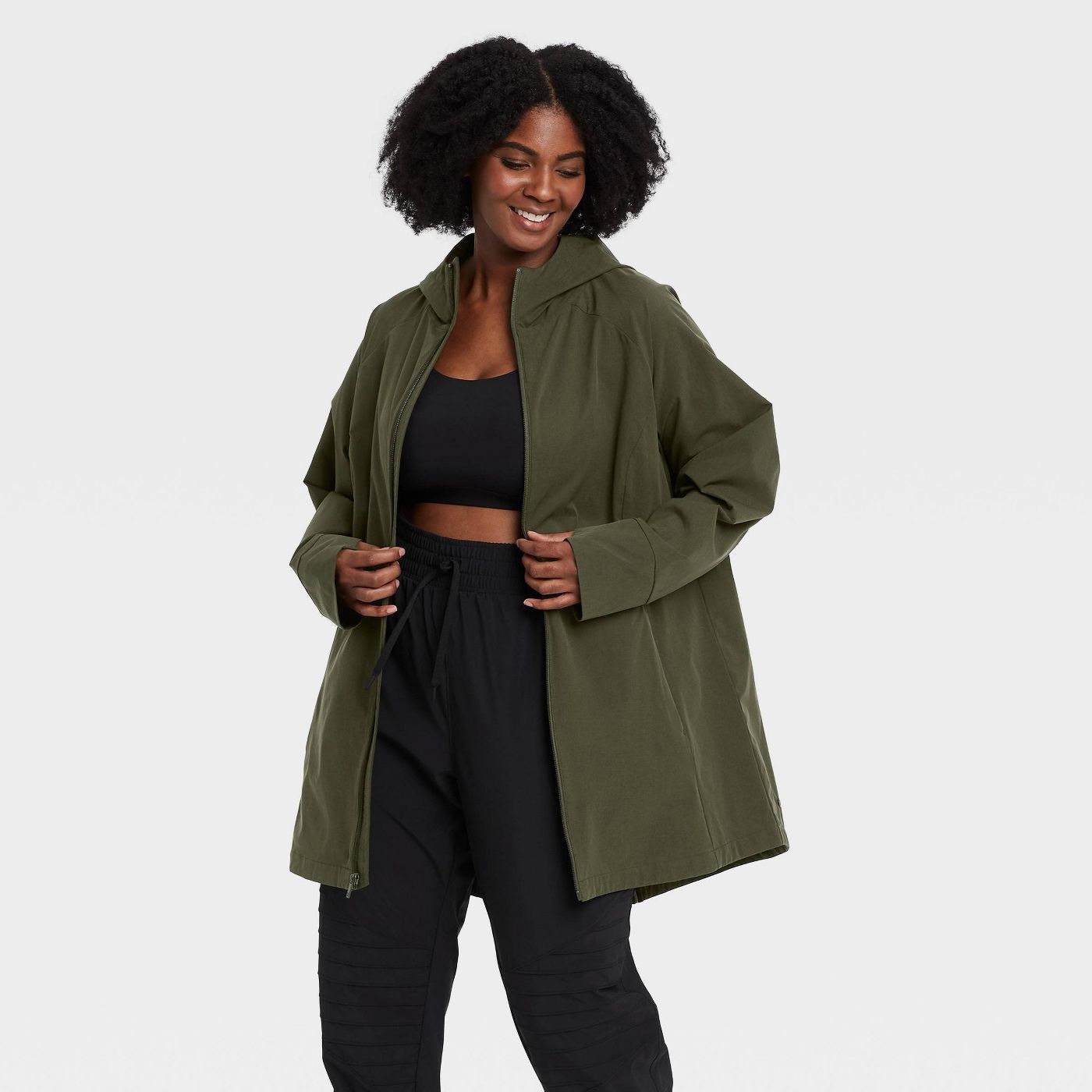 Model in green anorak jacket