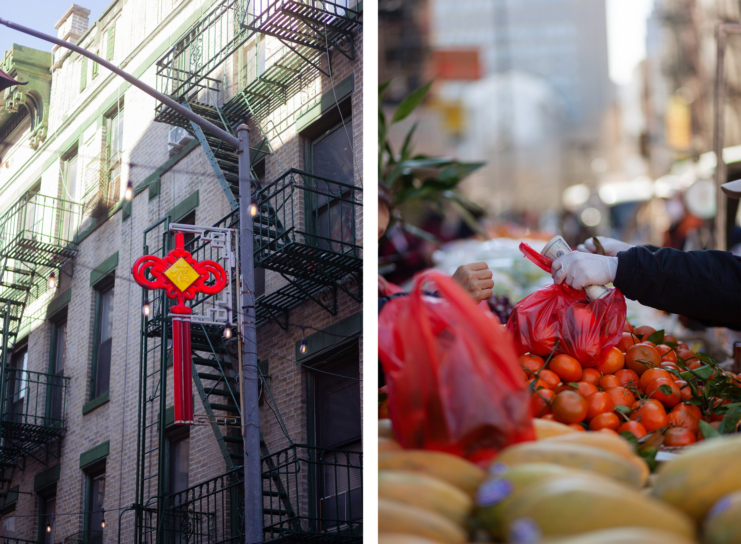 Chinese decorations are seen in the street and hands paying for oranges